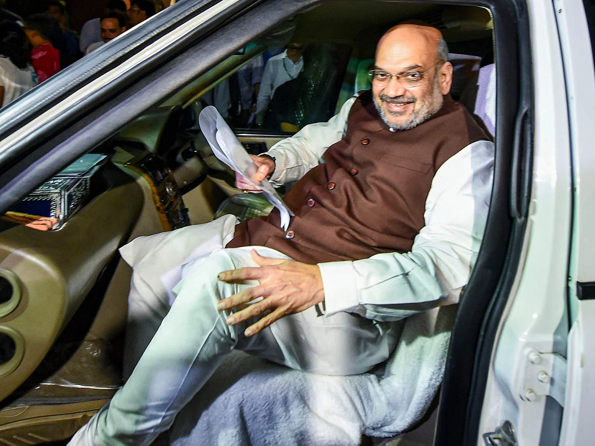 Home Minister Amit Shah leaves after the passage of the J&K Reorganisation Bill by the Rajya Sabha, at Parliament in New Delhi, on Aug. 5, 2019. (Photographer: Arun Sharma/PTI)