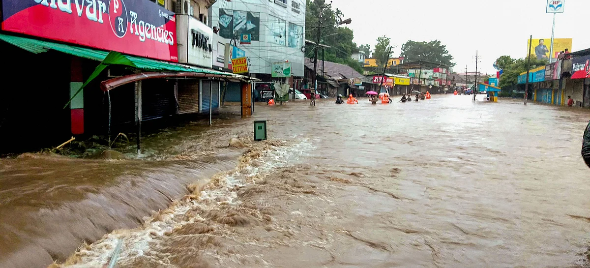A flooded street following incessant monsoon rainfall, at Kalpetta in Wayanad. (Source: PTI)