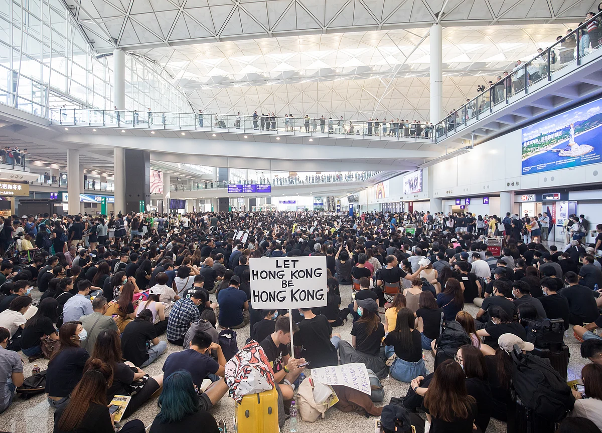 Hong Kong Cancels All Remaining Monday Flights as Protesters Swarm Airport