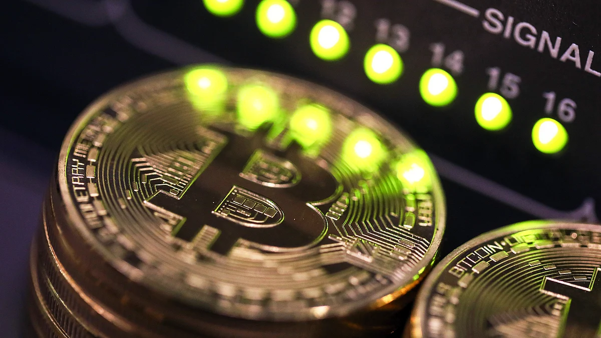 Bitcoins in an office in London, U.K. (Photographer: Chris Ratcliffe/Bloomberg)