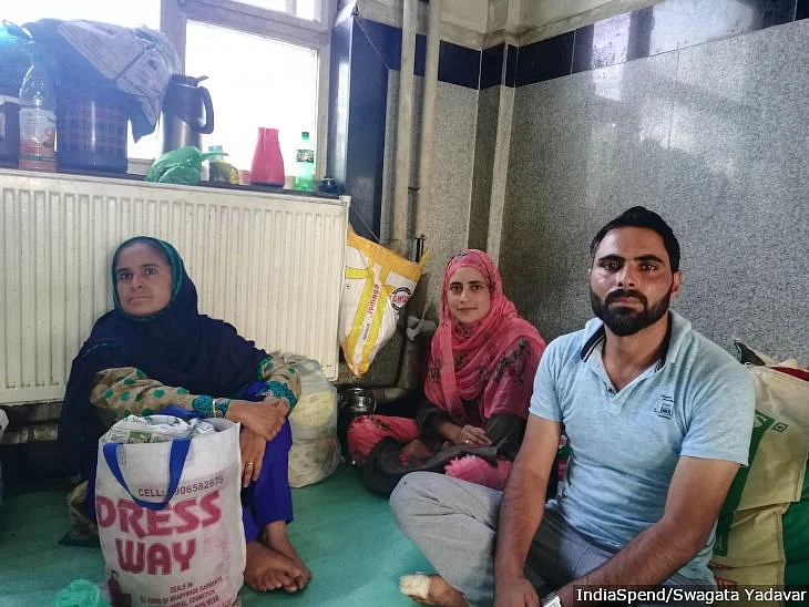 Abdul Qayoom and his wife Shaista sit with a relative in the waiting room of Lal Ded Maternity Hospital, Srinagar. The family lives in Nowgam, 8 km from the hospital, but because of security barriers and dead phones, they prefer to stay in the hospital for two days after discharge than come back for follow-up. “This 8 km feels like 80 km to us,” says Qayoom.