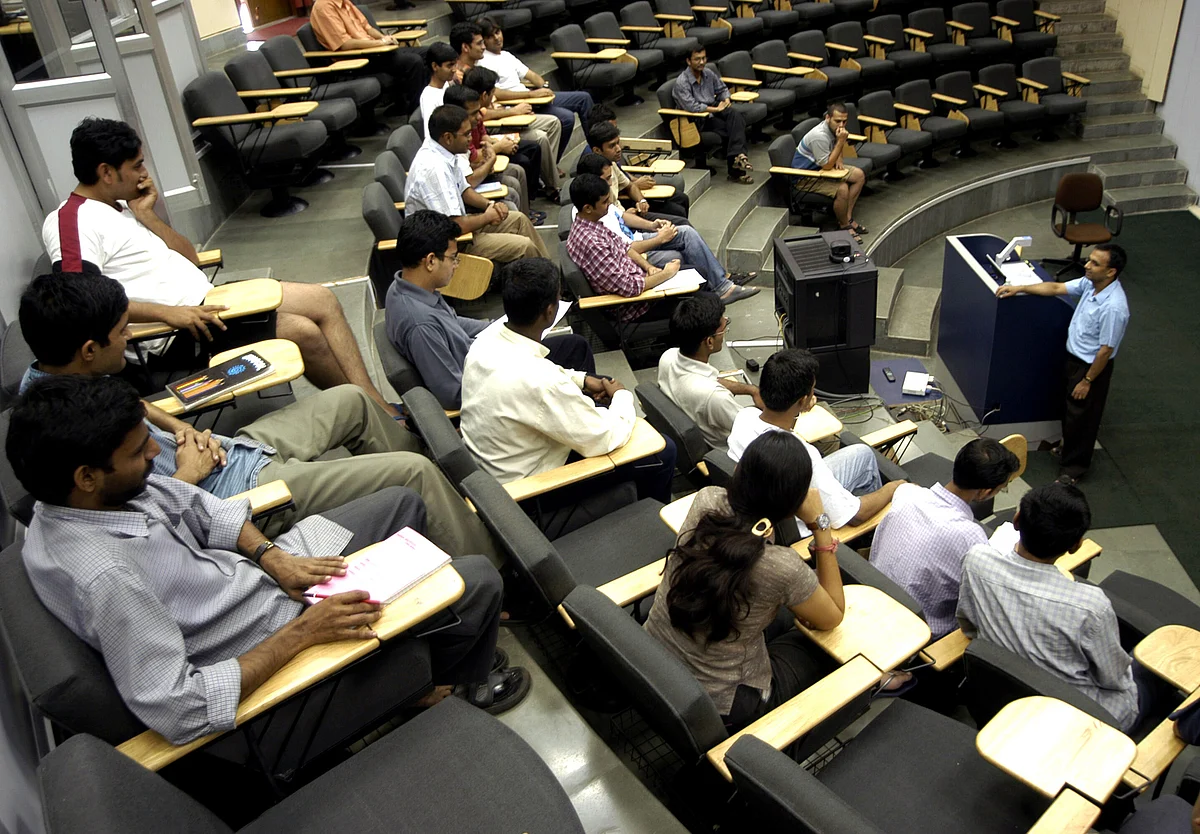 Students attend a lecture in the Seminar Hall at the Indian Institute of Technology, Bombay in Mumbai (Photographer: Santosh Verma/ Bloomberg News) 