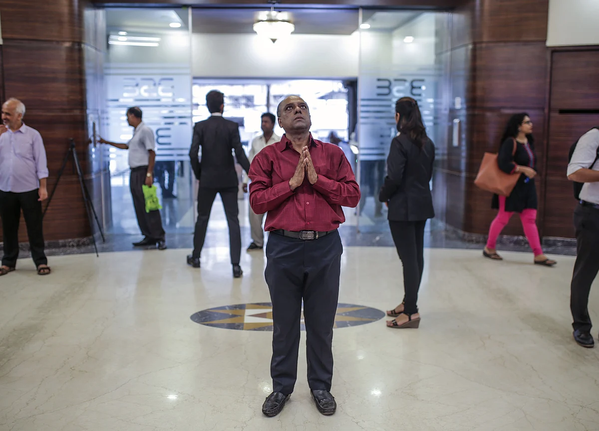 Sensex, Nifty Recoup Most Of Weekly Losses In Friday Rally