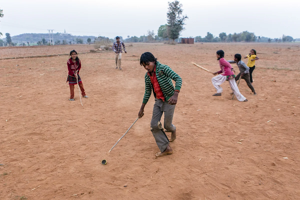Children play in a dried-up field in Tikamgarh, Madhya Pradesh. (Photographer: Prashanth Vishwanathan/Bloomberg)