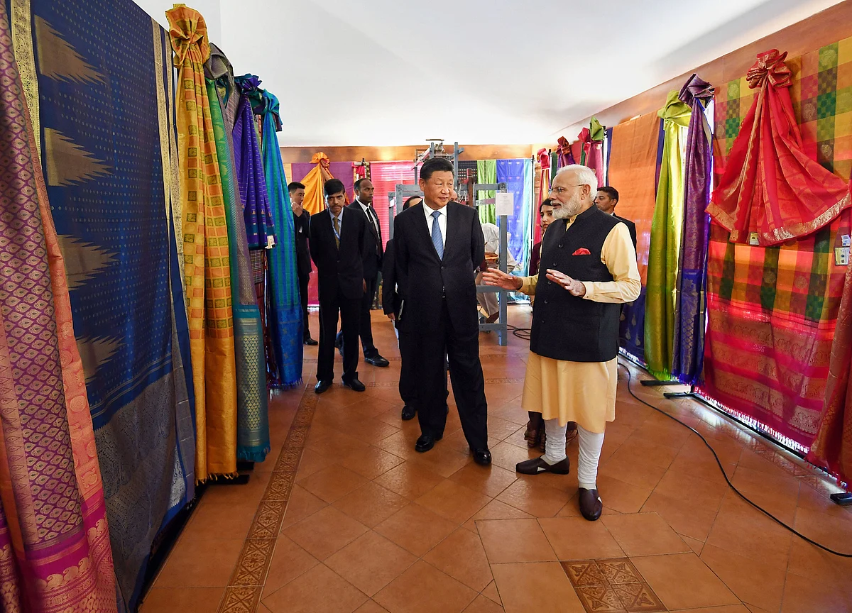 Xi, Modi Agree on New Trade Mechanism at Seaside Talks in India