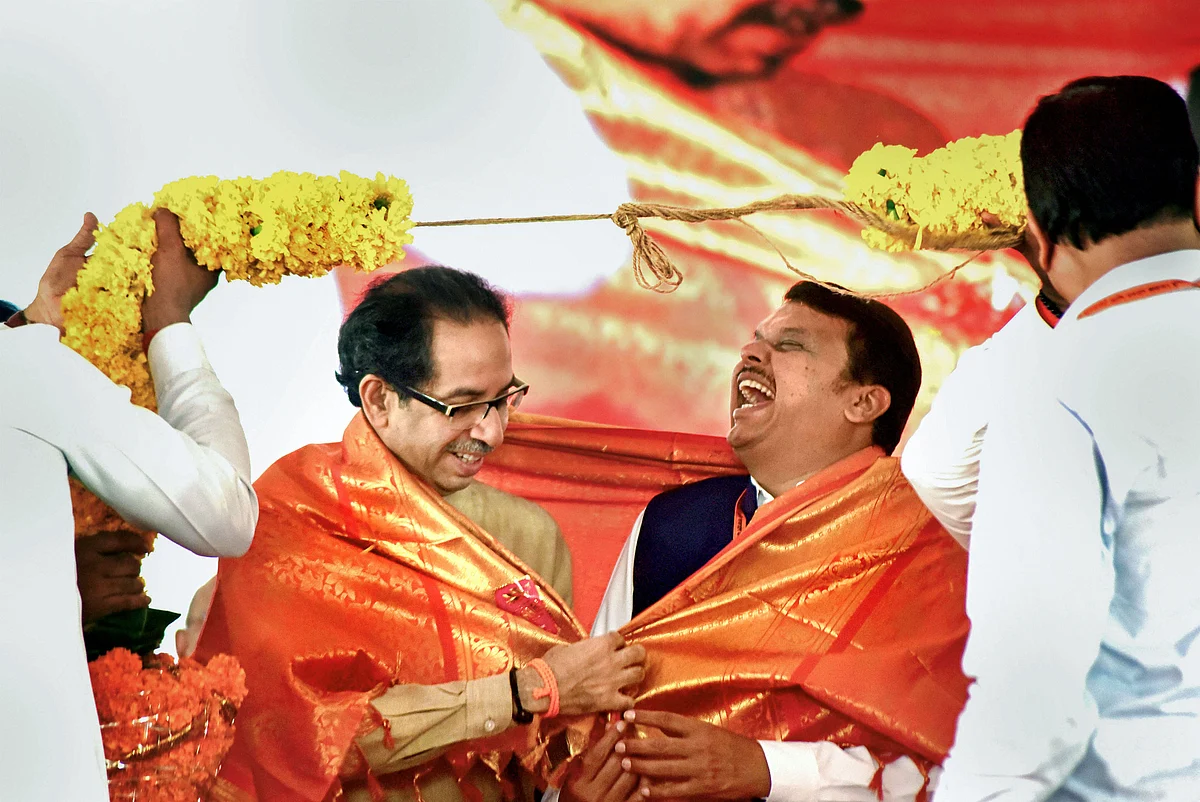 Uddhav Thackeray and Devendra Fadnavis, in Navi Mumbai, on Sept. 25, 2019. (Photograph: PTI)