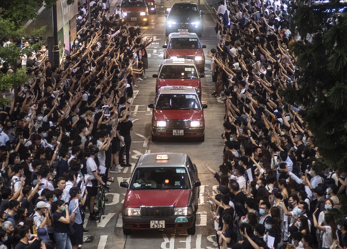Police Call for Hong Kong Curfew as Shooting of Protester Sparks Fury