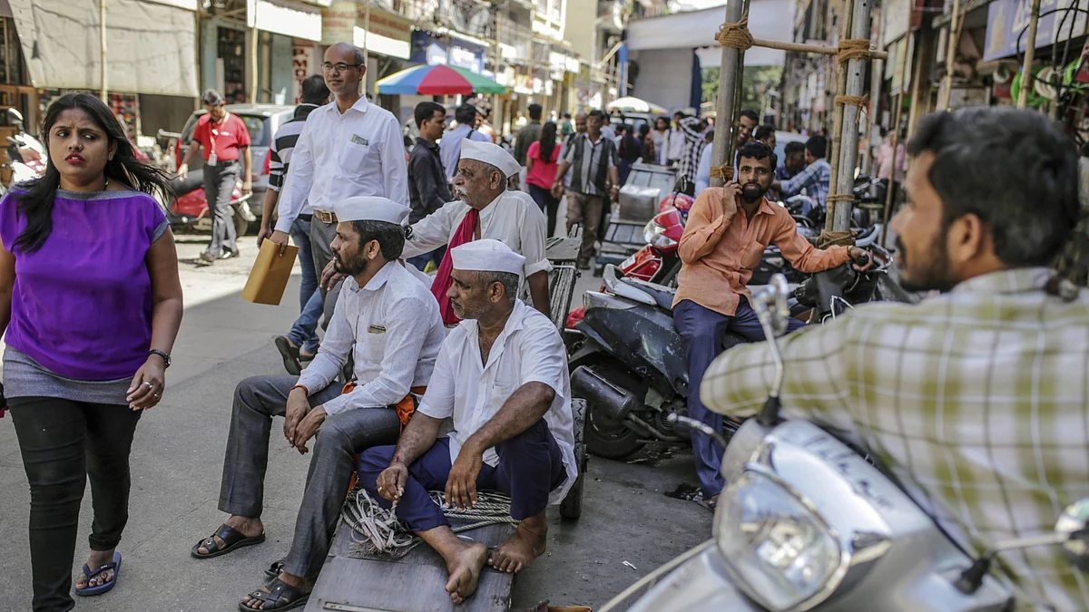 Labourers waiting for work at fort market in Mumbai, India. (Photographer: Dhiraj Singh/Bloomberg)