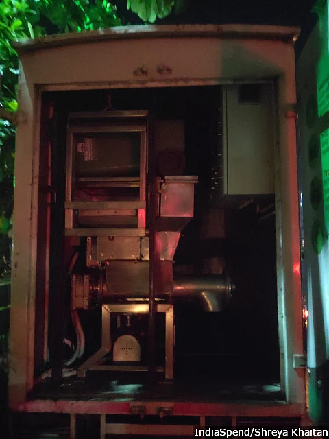 A mobile composting van near the street food market, <em>56 Dukaan. </em>All food outlets separate food waste and give it to the Swaha, the company operating this decentralized composter. 