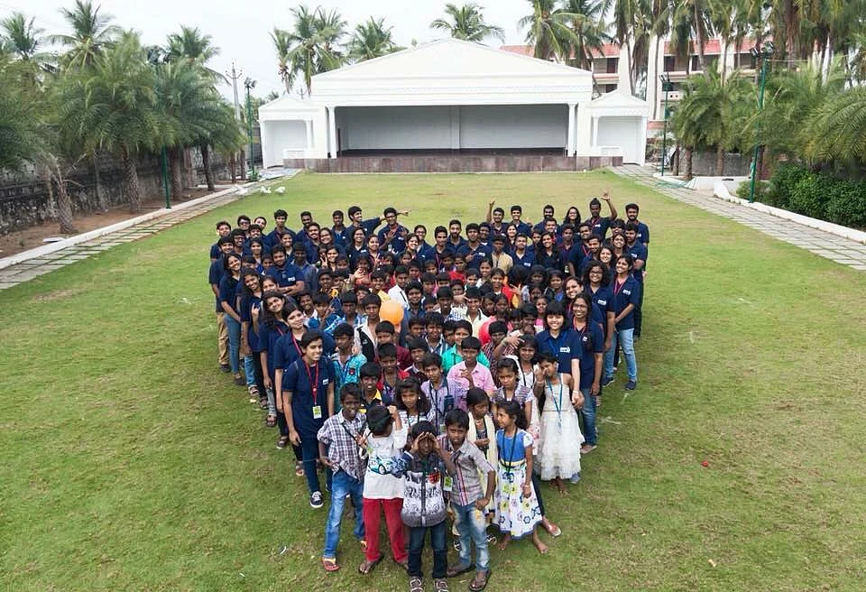 MAD Volunteers And Children