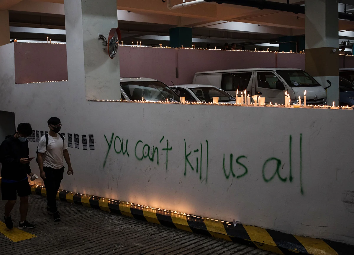Hong Kong Police Fire Warning Shot After Death Fuels Clashes