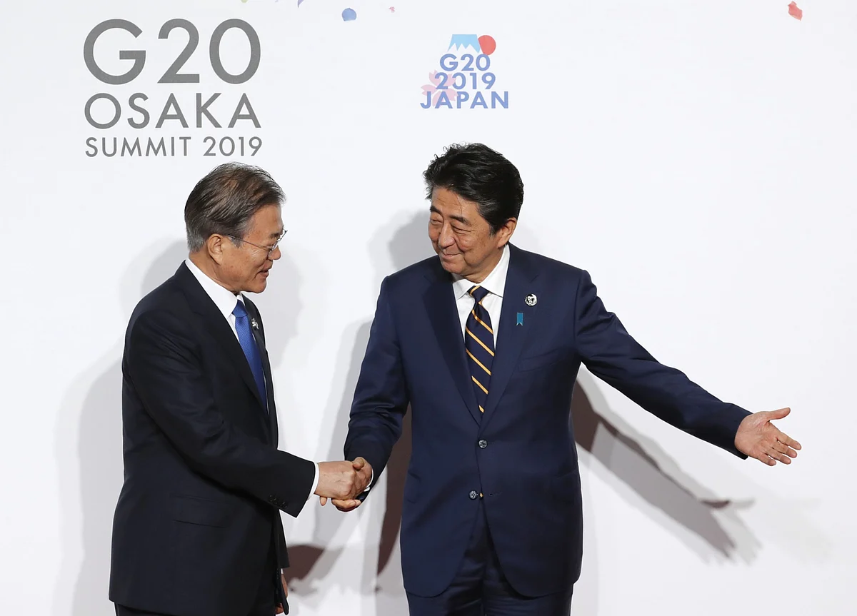 Abe, Moon Break Ice After Worst Japan-South Korea Fight in Years