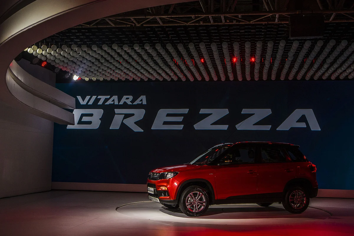 A Maruti Suzuki India Ltd. Vitara Brezza stands on display during its launch at the Auto Expo 2016 in Noida, Uttar Pradesh, India. (Photographer: Prashanth Vishwanathan/Bloomberg) 