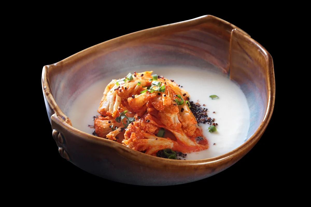Chilli garlic cauliflower, cashwe cauliflower puree, black quinoa. Dish from Chef Vineet Bhatia’s new Earth, Land and Sea menu. (Image courtesy: Ziya, The Oberoi, Mumbai)
