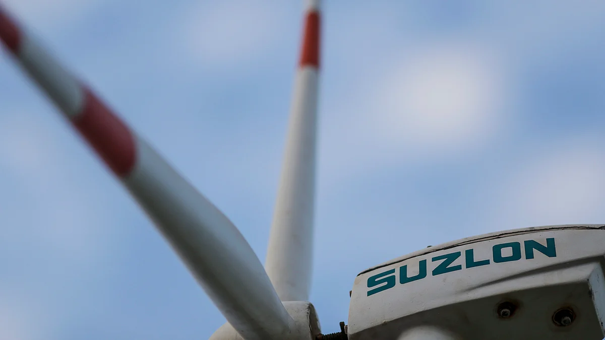 The Suzlon Energy Ltd. logo is displayed on a wind turbine in Kutch. (Photographer: Dhiraj Singh/Bloomberg) 