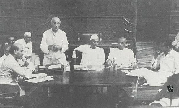 Jawaharlal Nehru addressing a meeting of a committee of the Constituent Assembly New Delhi, 1949. Rajendra Prasad and Vallabhbhai Patel are seated next to Nehru. (Photograph: NMML/Government of India)