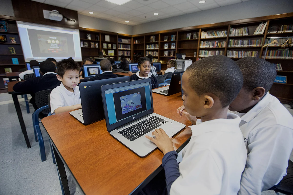 Students in a third grade technology class on laptops in Boston, Massachusetts. (Photographer: Scott Eisen/Bloomberg)