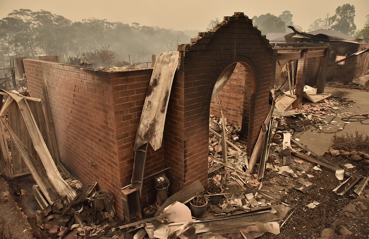 A home destroyed by bush fires is seen in Carrabar, New South Wales, Australia, on Dec. 31, 2019. (Photographer: Mark Graham/Bloomberg)
