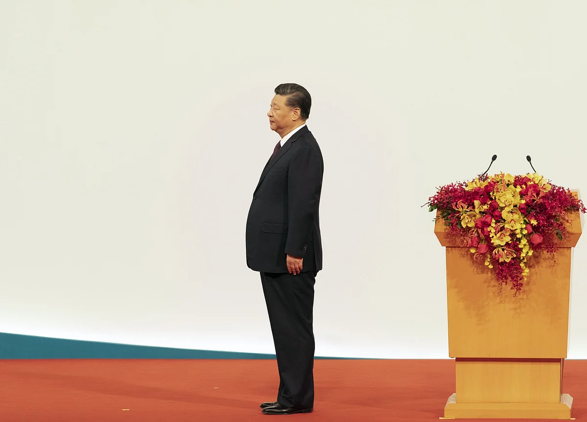 Xi Defends China’s Model for Hong Kong After Restive Year