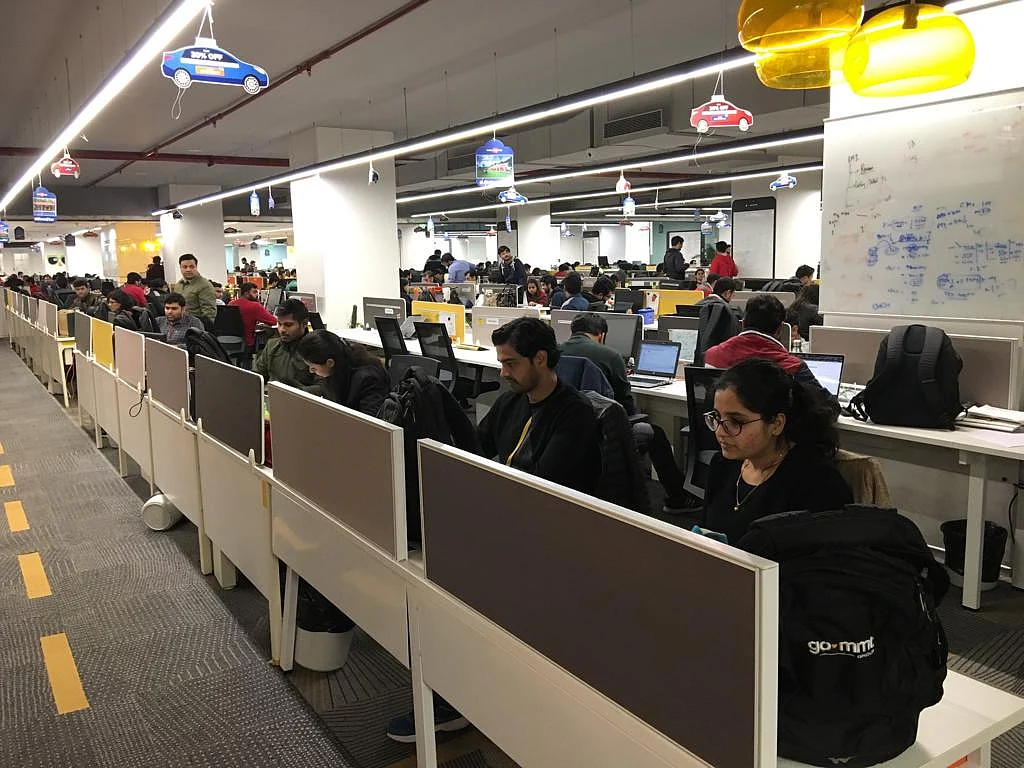 Employees at work in the MakeMyTrip office in Gurgaon. (Photograph: Surat Singh/BloombergQuint)
