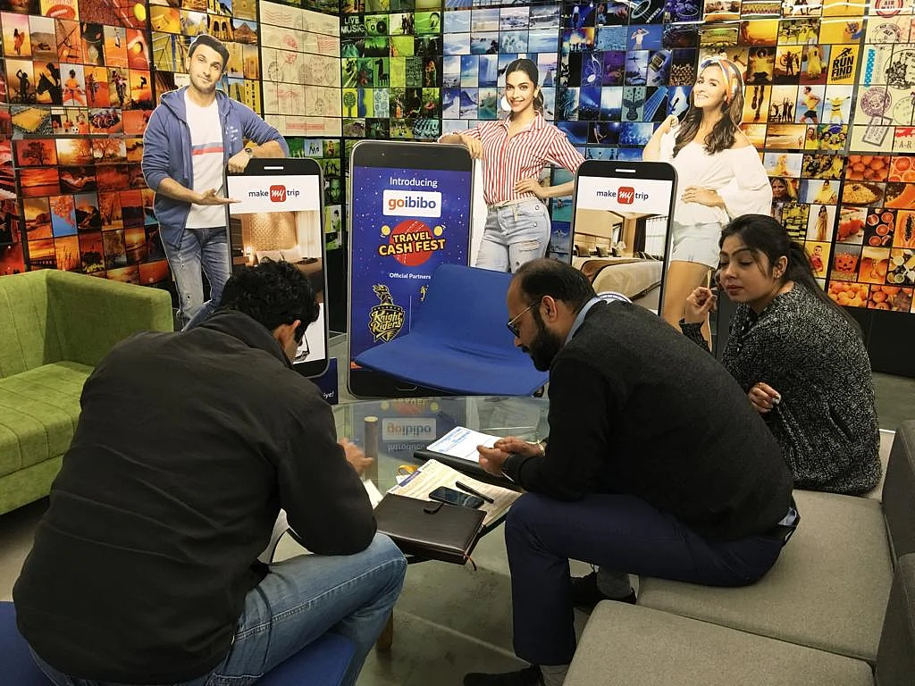 Employees at the MakeMyTrip office in Gurgaon. (Photographer: Surat Singh/BloombergQuint)
