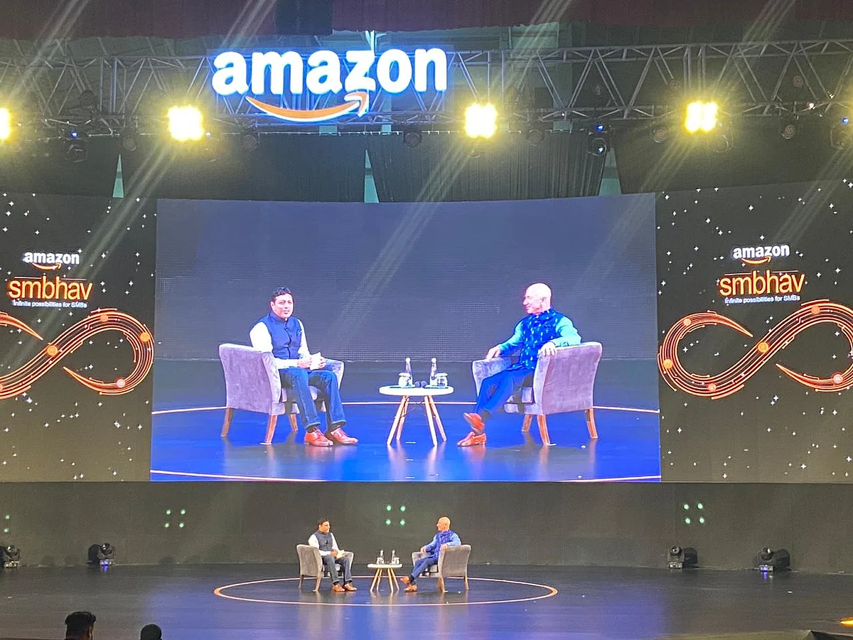 Billionaire and CEO of Amazon, Jeff Bezos with Amazon India chief Amit Agarwal at the SMBhav event in New Delhi. (Source: BloombergQuint)