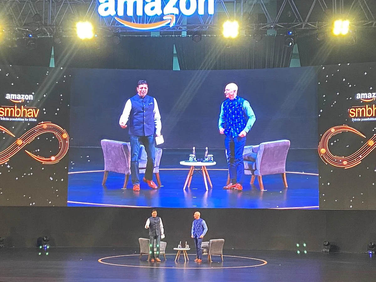 Billionaire and CEO of Amazon, Jeff Bezos with Amazon India chief Amit Agarwal at the SMBhav event in New Delhi. (Source: BloombergQuint)