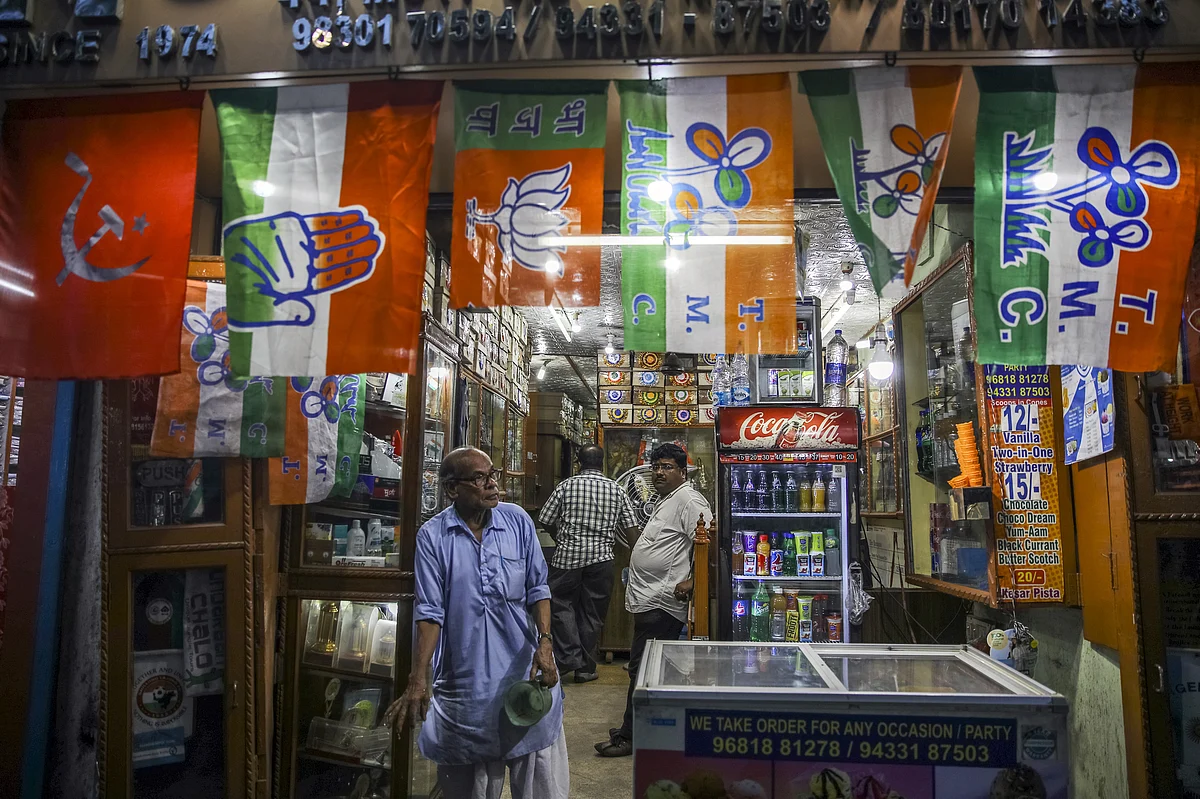 Various political party flags are displayed for sale at a store in Kolkata. (Photographer: Prashanth Vishwanathan/Bloomberg)