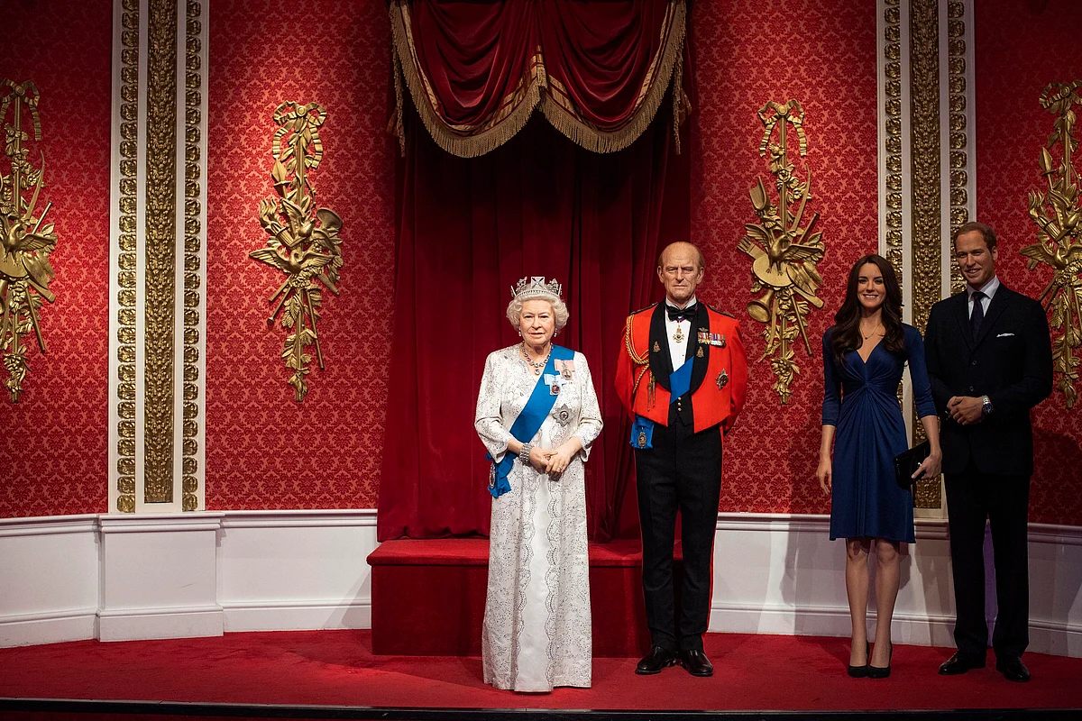 The empty space after the figures of Britains Prince Harry and Meghan, Duchess of Sussex, were removed next to Queen Elizabeth II, Prince Philip and Prince William and Kate, Duchess of Cambridge, at Madame Tussauds in London, Thursday Jan. 9, 2020. Madame Tussauds moved its figures of Prince Harry and Meghan, Duchess of Sussex from its Royal Family set to elsewhere in the attraction. (AP Via PTI) 
