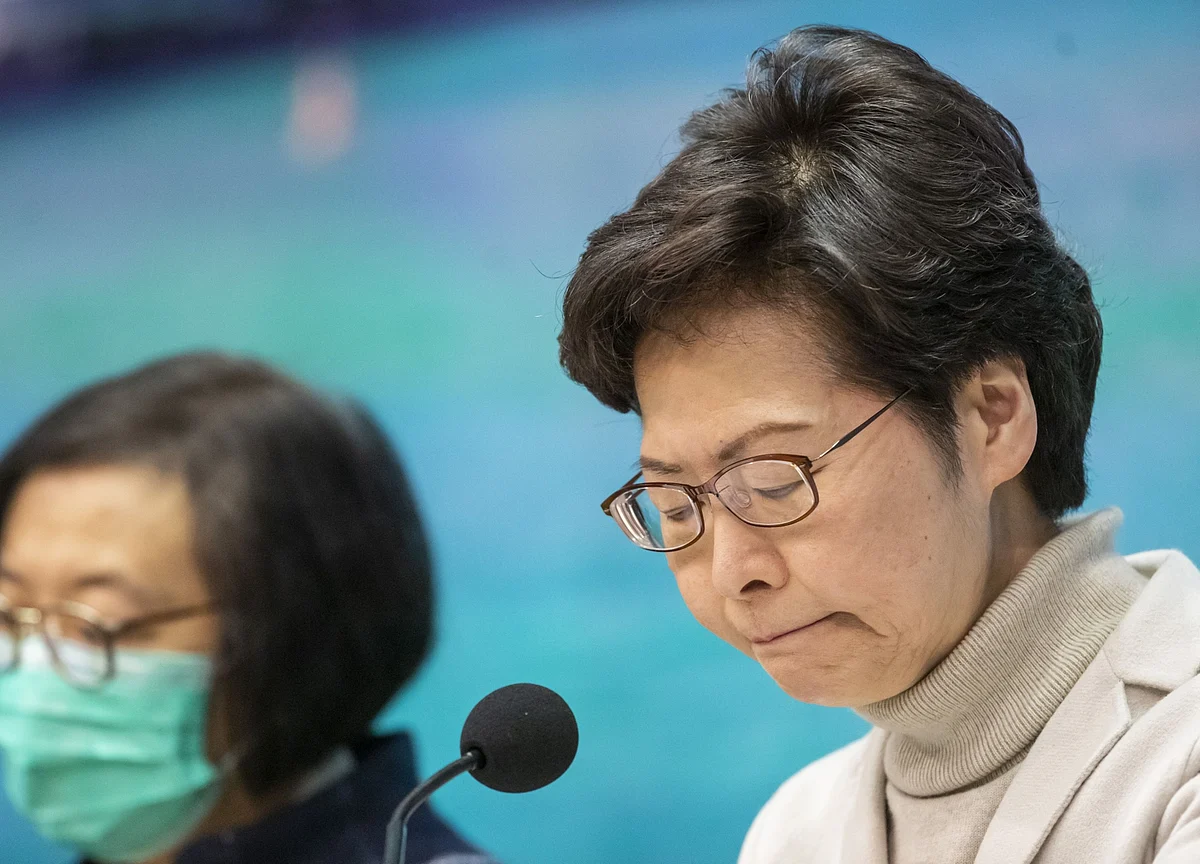 First Virus Death Reported in Hong Kong Puts Pressure on Lam