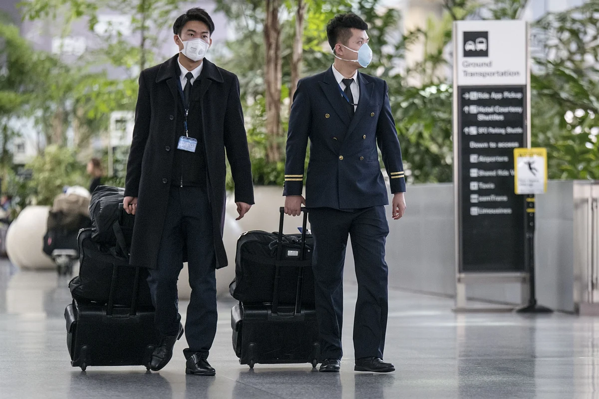 China Travel Curbs Widen With Global Virus Contagion Fears Rising