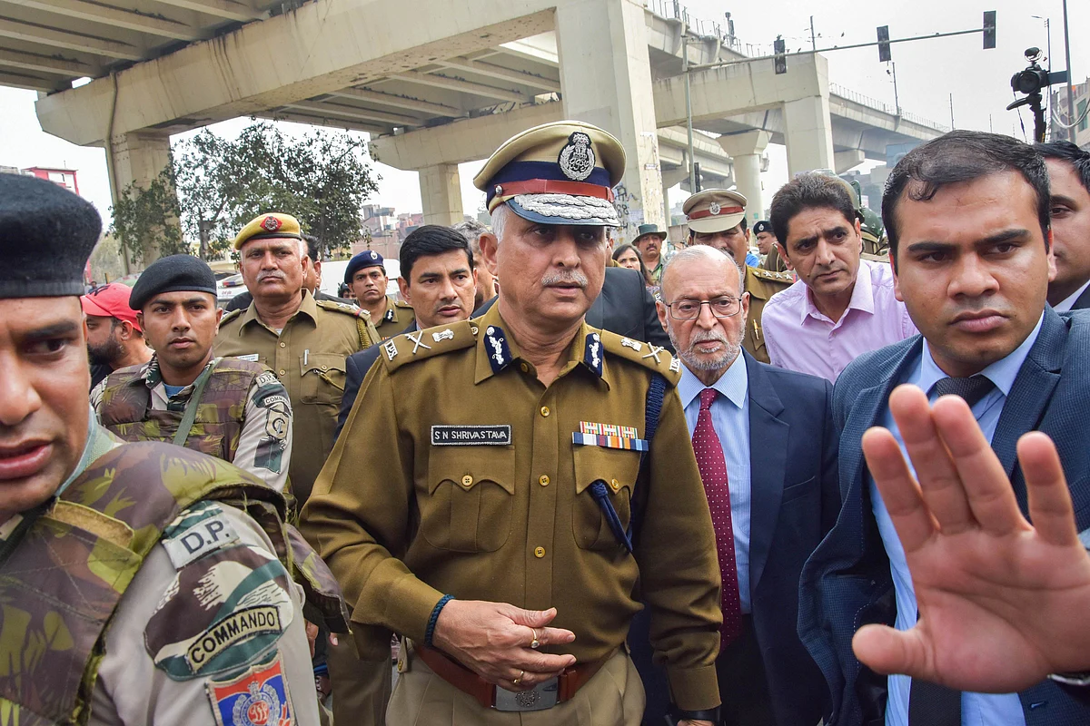 Delhi Police Commissioner SN Shrivastava along with Lt Governor Anil Baijal inspects Maujpur Chowk area of the riot-affected northeast Delhi (Source: PTI)