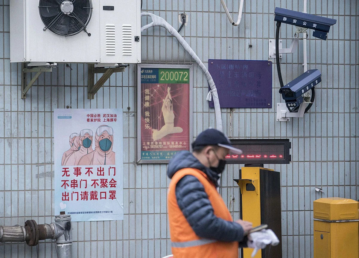 China’s Surveillance State Pushed to the Limits in Virus Fight
