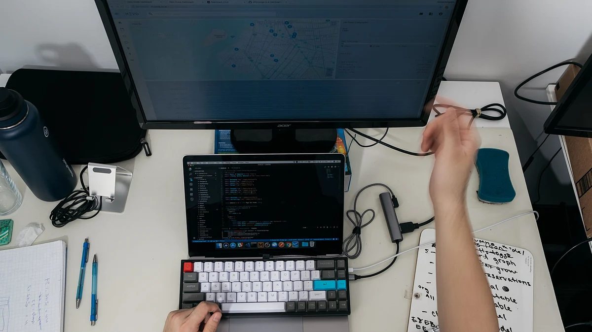A software developer works on a laptop computer. (Photographer: Christopher Lee/Bloomberg)