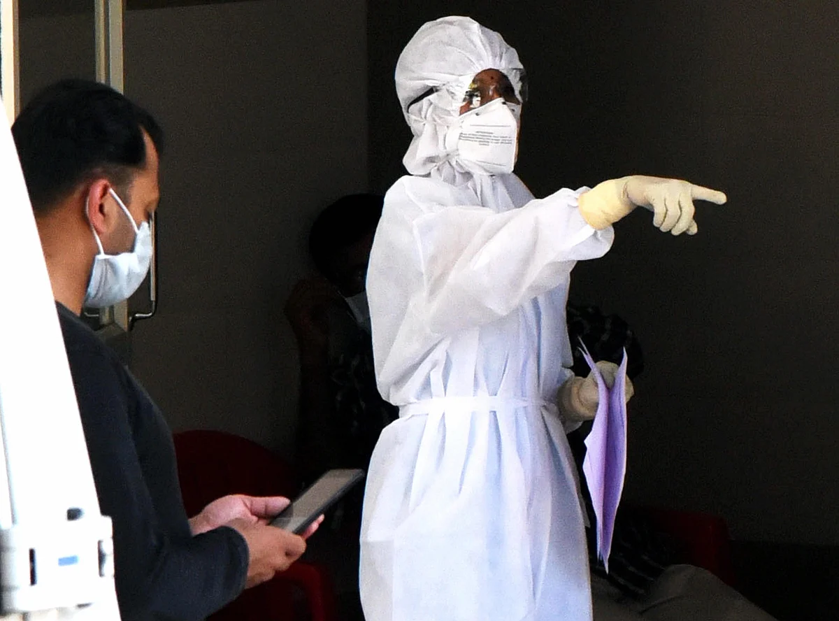 A medic wearing protective suit, outside an isolation ward, at a government general hospital in Kochi, Kerala, on March 15, 2020. (Photograph: PTI)