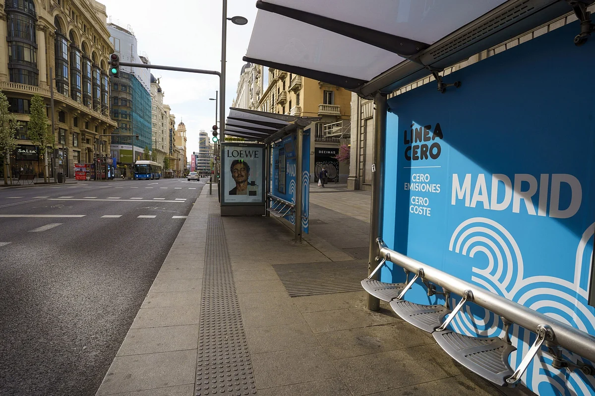 Empty bus stops line Gran Via Street in Madrid, Spain, on Sunday, March 15, 2020. Spain declared a state of emergency effective immediately for 15 days. (Photographer: Angel Navarrete/Bloomberg)