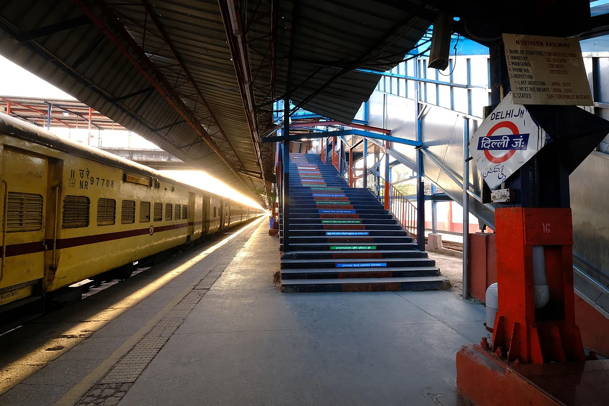 A sign for Delhi Junction is displayed at a platform inside the empty Delhi Junction railway station during a lockdown imposed due to the coronavirus in Delhi, India. (Photographer: T. Narayan/Bloomberg)