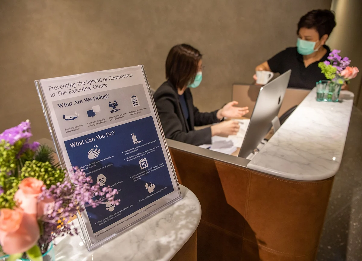 What Returning to Work Will Look Like in Offices, Cafes and Factories Around the World