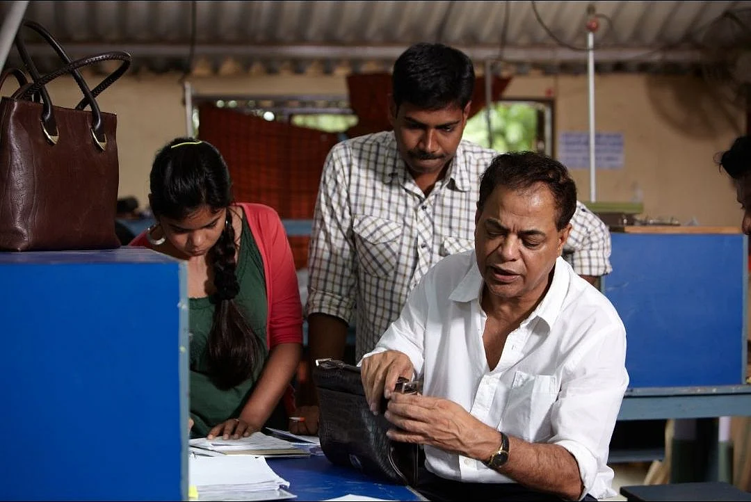 Dilip Kapur (right) with team members at the Hidesign workshop. (Photo: Hidesign)