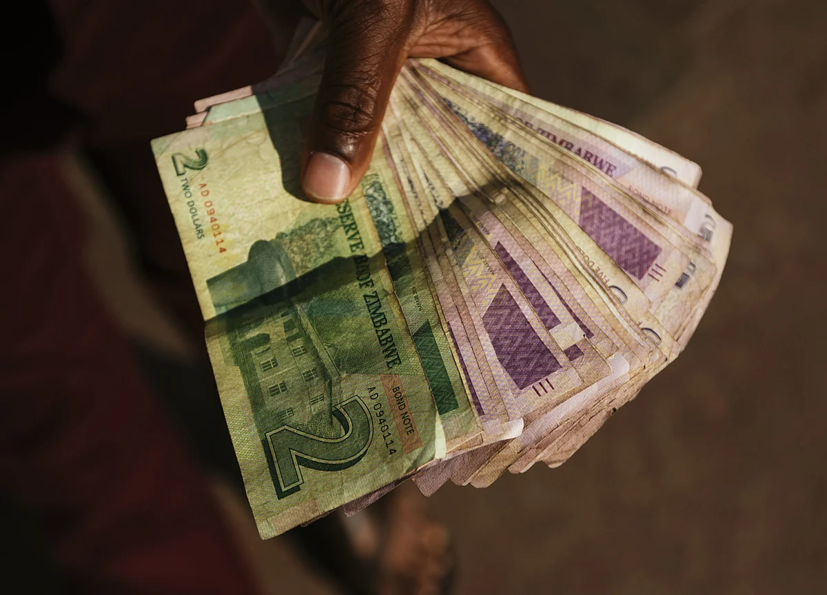 Zimbabwe Halts Stock Exchange, Mobile Money to Calm Currency