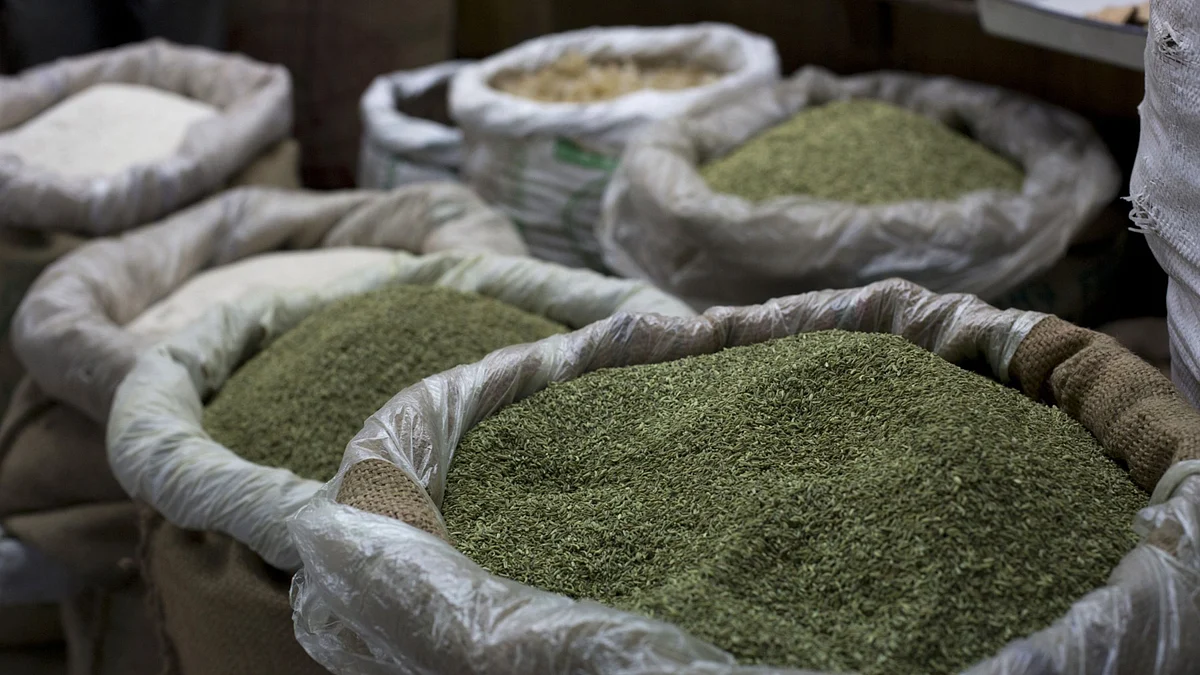 Grain is displayed for sale in the Burrabazar area of Kolkata, India, on Tuesday, Feb. 19, 2013. Photographer: Brent Lewin/Bloomberg 