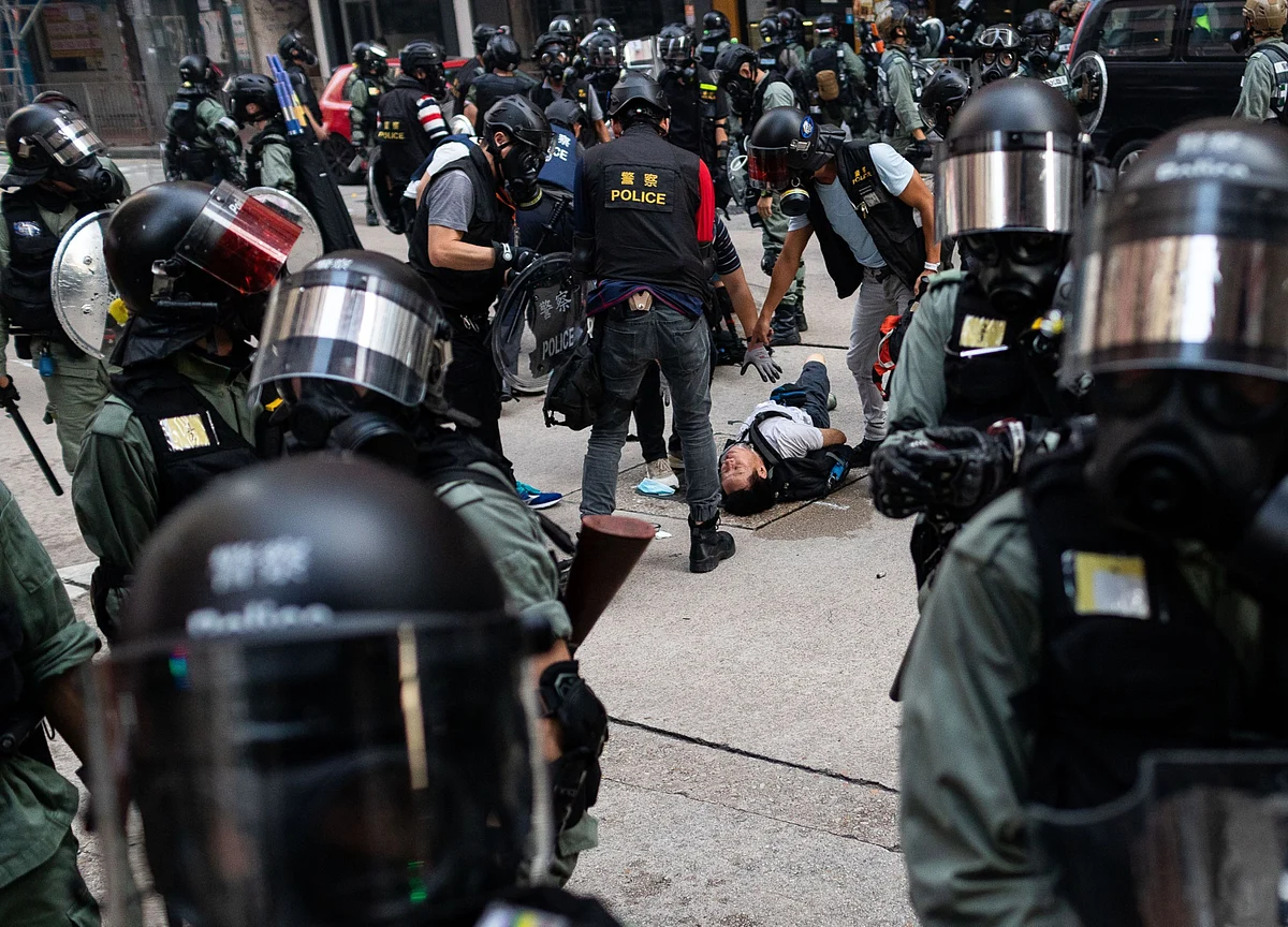 Arrested Under New Law, Hong Kong Protesters Get Swabbed for DNA