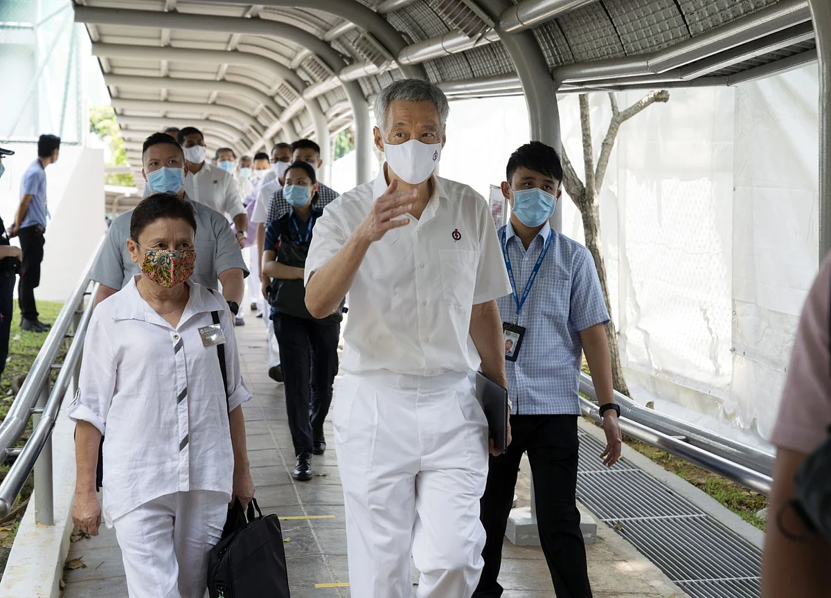 Singapore’s Lee Retains Power But Party Has Weakest Showing Ever