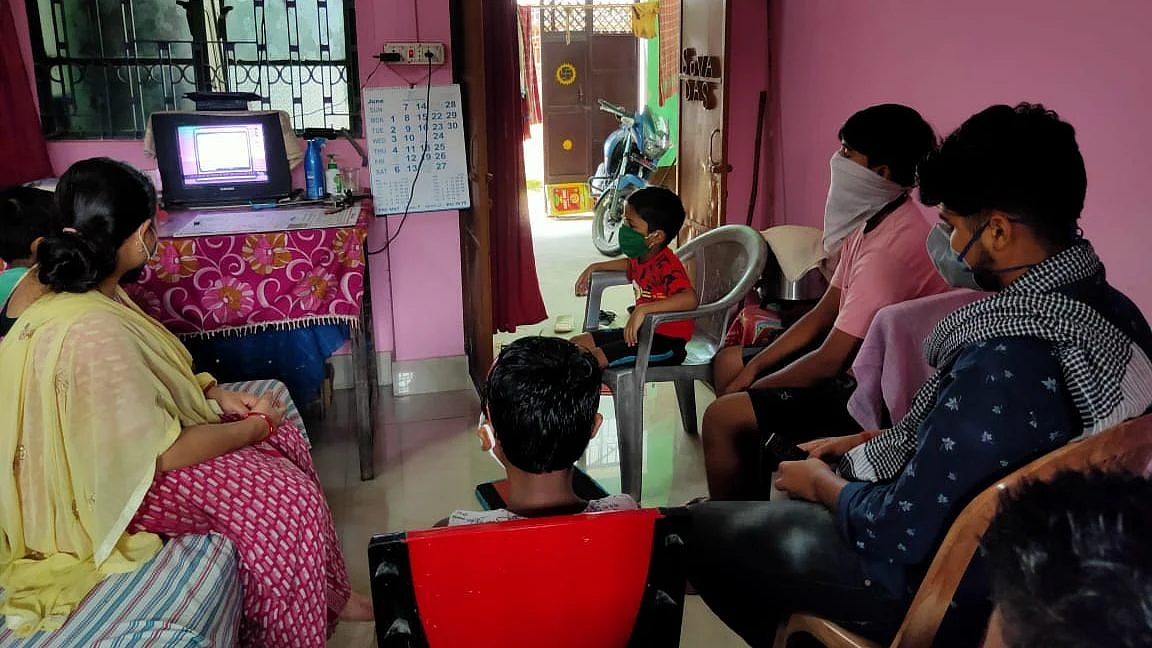 A family gathers to watch School TV. (Image: The Quint)