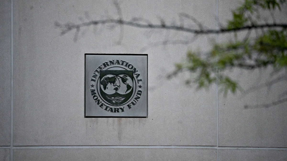 Signage hangs at the IMF headquarters in Washington, D.C., U.S. (Photographer: Andrew Harrer/Bloomberg)