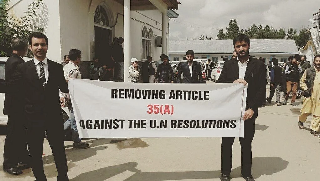 Habeel Iqbal, left, protesting outside Shopian District Court, in 2018. (Photograph courtesy: Habeel Iqbal)