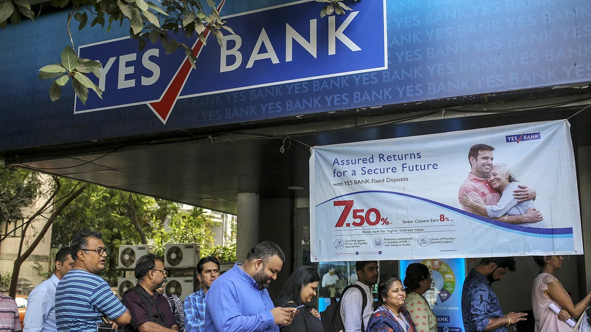 Customers stand in line outside a Yes Bank Ltd. branch in Mumbai, India. (Photographer: Dhiraj Singh/Bloomberg)