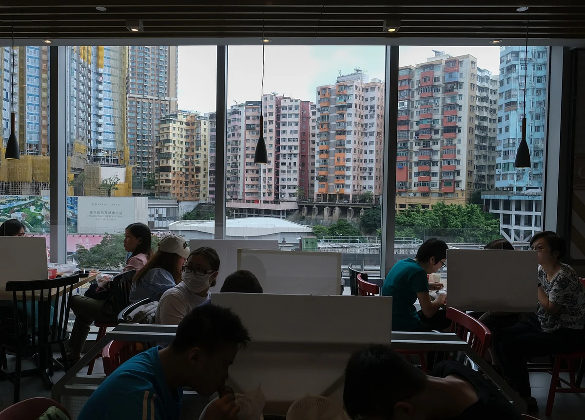 Chinese Buy Up Real Estate But Hold Off on Dining Out, Gambling