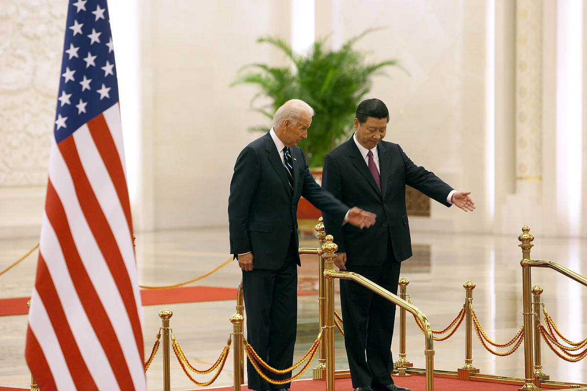 Xi Jinping with Joe Biden, in Beijing, on Aug. 18, 2011. (Photographer: Nelson Ching/Bloomberg)