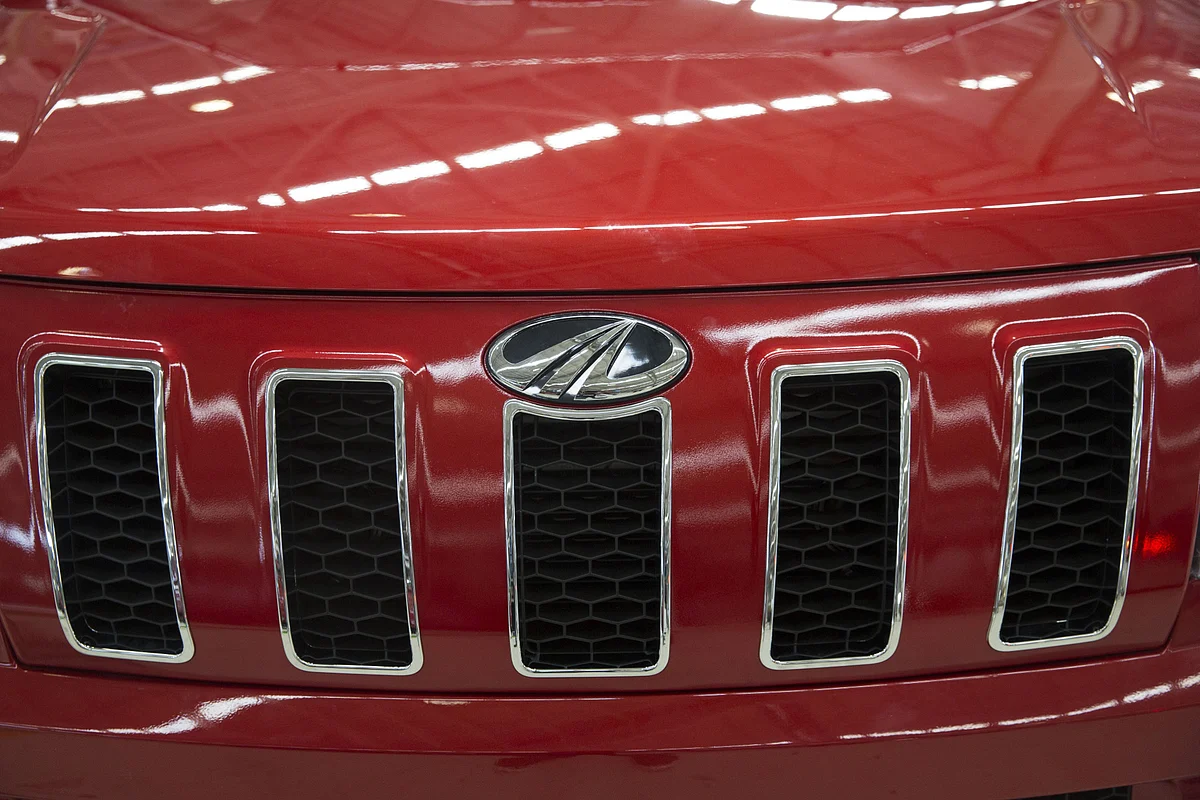 The Mahindra logo sits on the grille of a TUV 300 SUV on the production line at the company’s facility in Chakan, Maharashtra, India on April 2, 2018. (Photographer: Udit Kulshrestha/Bloomberg)